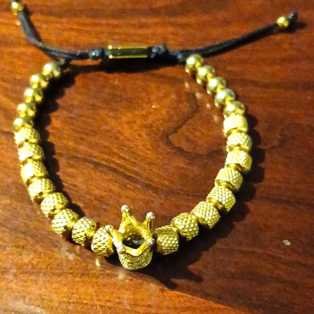 18 karat gold stainless steel bracelet.